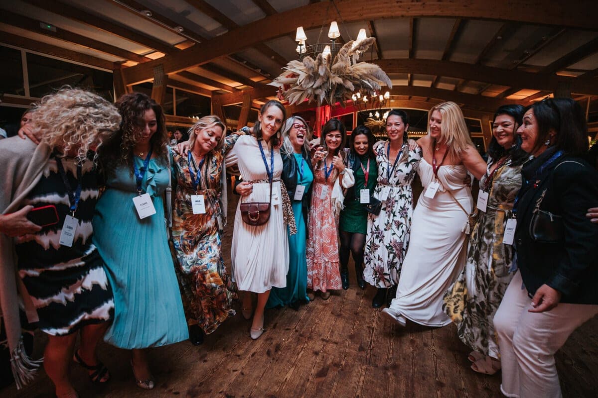 Delegates dancing together at an evening event