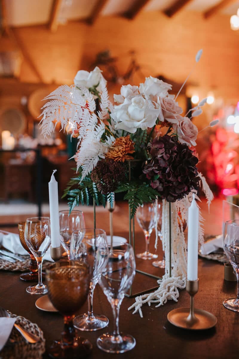 Candlelit gala table with a floral centrepiece
