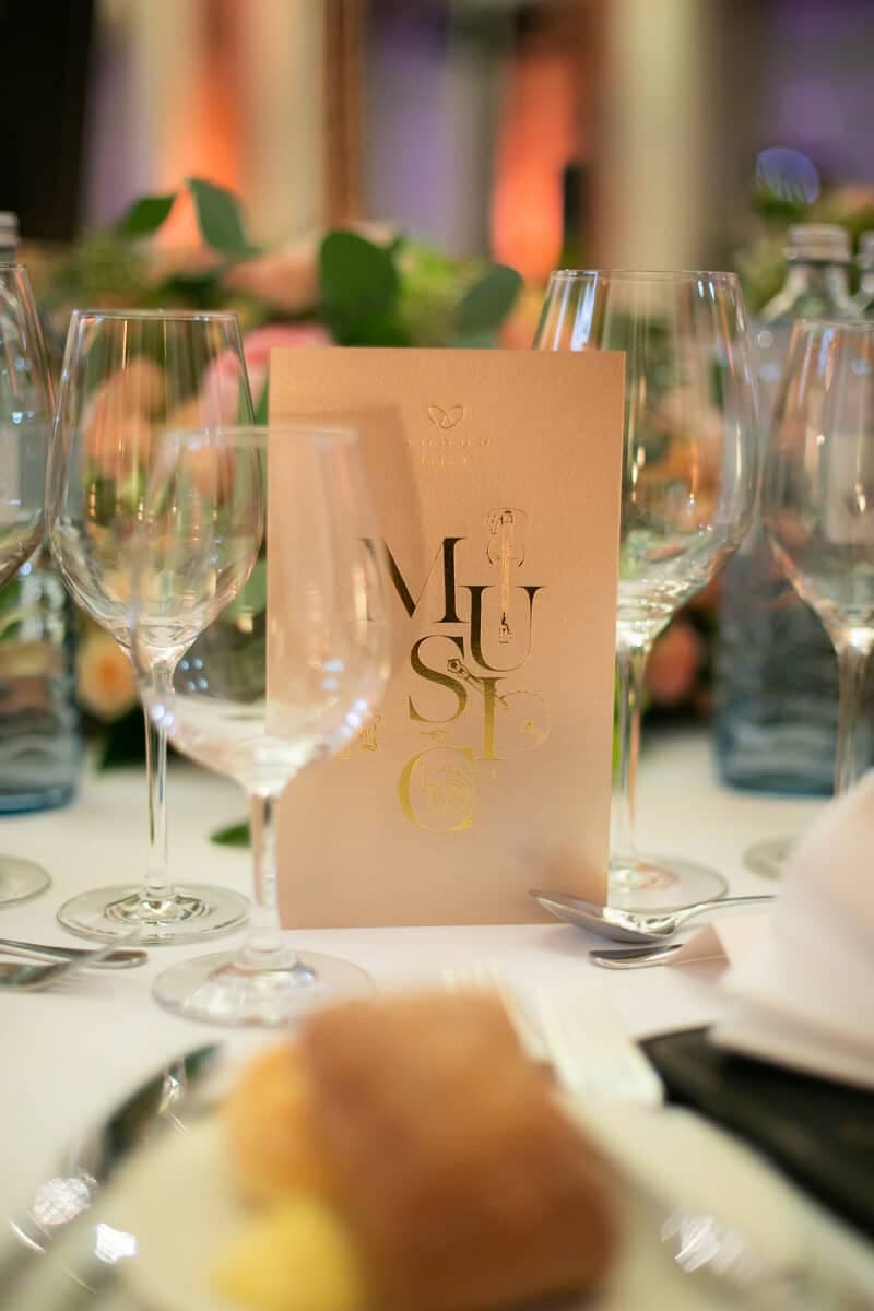 Gala dinner place setting with a menu card